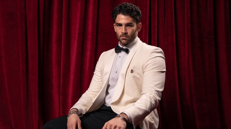 Hasan Piker wearing a suit