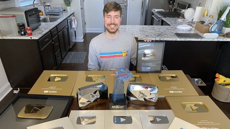 MrBeast with YouTube subscriber button awards