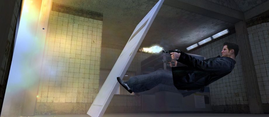 May Payne diving backwards while a door explodes